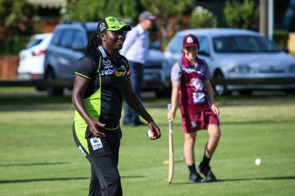 FUN TIMES: Sydney Thunder's Stafanie Taylor joins in the family fun day at Wodonga's Kelly Park. Picture: JAMES WILTSHIRE