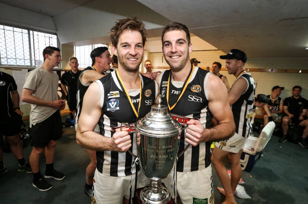 TAKE A BOW: Wangaratta siblings Judd (left) and Daine Porter finished their careers by claiming their third premiership. Picture: JAMES WILTSHIRE