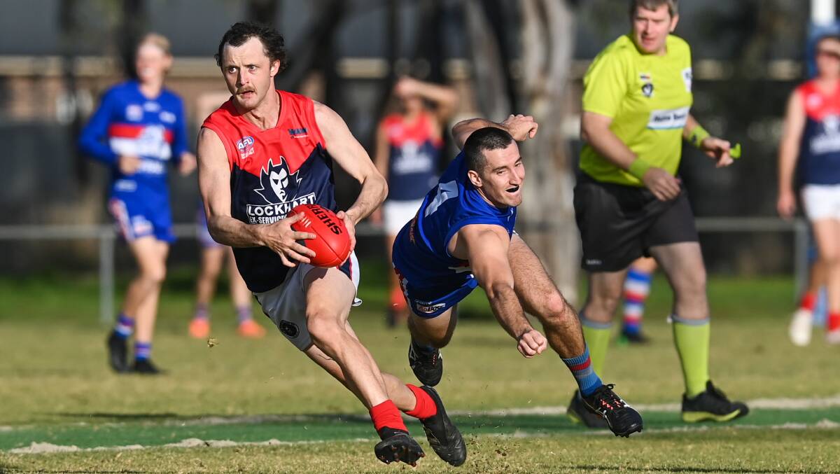 Wooden in action for the Demons.