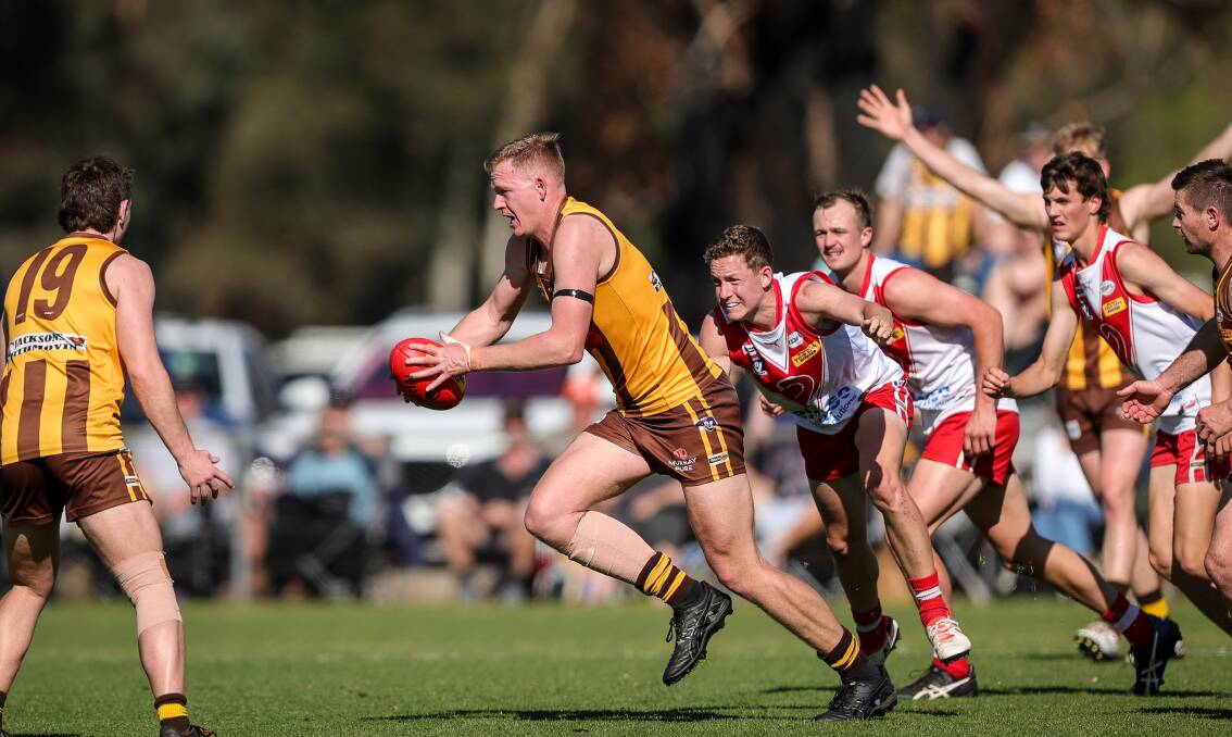 Big Hawk Tristan Mann is looking forward to the challenge of rucking against Swans duo Dean Heta and Jeremy Luff on the weekend. 