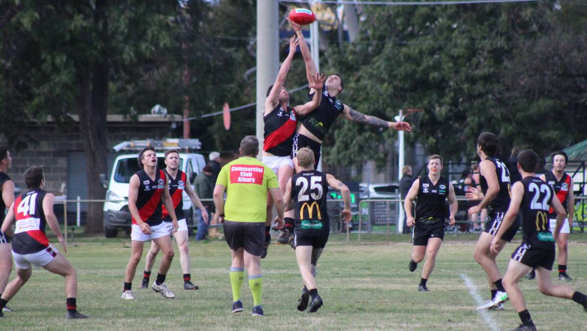 THE BIG MEN FLY: Bonnie Doon's Jaden Findlay contests a hit-out against big Panther Nicholas Spencer. Picture: GARRY JONES