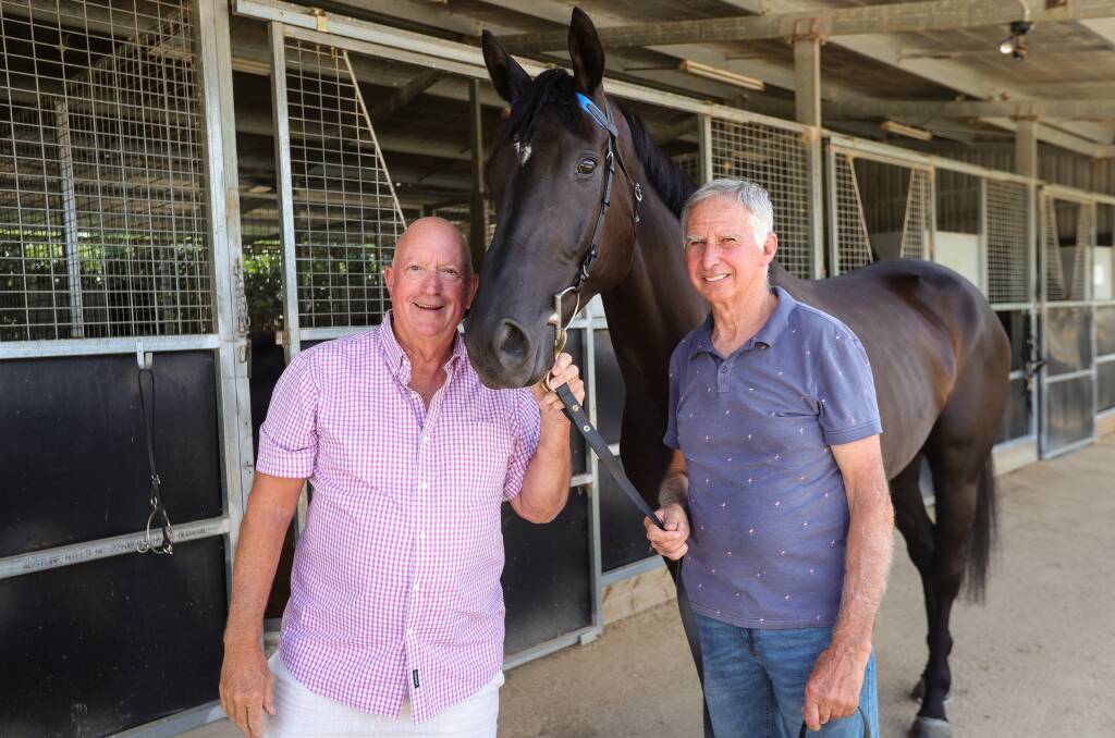 Bianco Vilano, with part-owner Bruce McNamara and trainer Ron Stubbs, will start in the Albury City Handicap on Thursday. Picture by James Wiltshire
