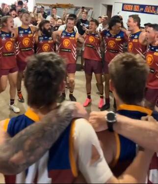 Jubilant Wahgunyah players belt out the club song for the first time in almost three years on Saturday.