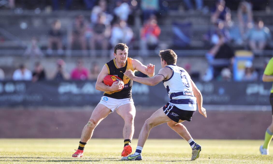 Powell in action during last year's epic grand final against Yarrawonga.