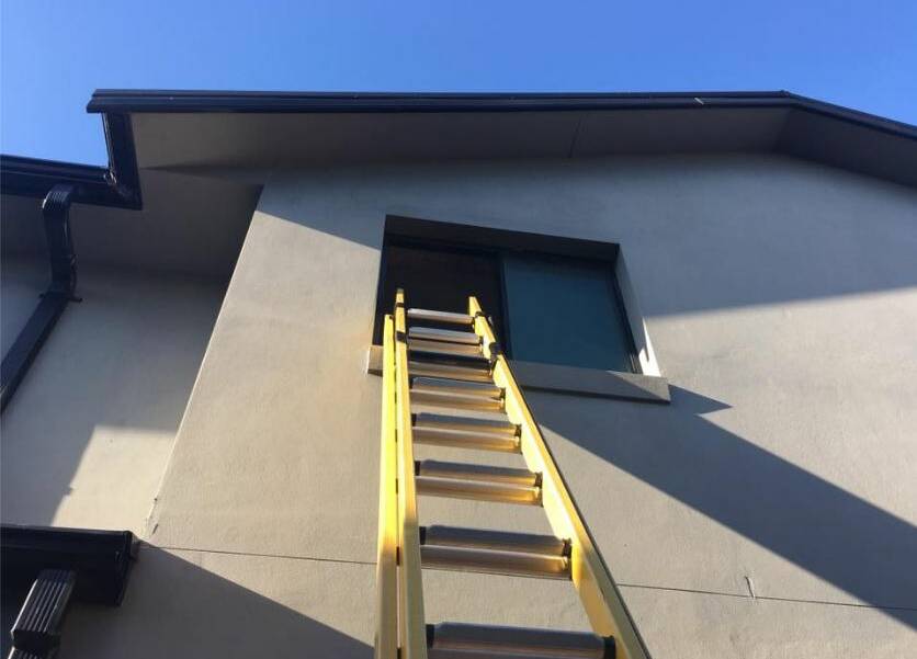 A ladder leading to the bathroom of a Kiama townhouse shows where the trapped man climbed to freedom. Picture: NSW SES Kiama Unit