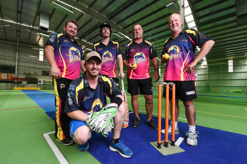 UP FOR THE CHALLENGE: Luke Bartley (front) Matt Neven, Dennis James, David Bergowicz and Craig Scammell will represent the Albury Warriors in the National Indoor Cricket League this year. Picture: MARK JESSER