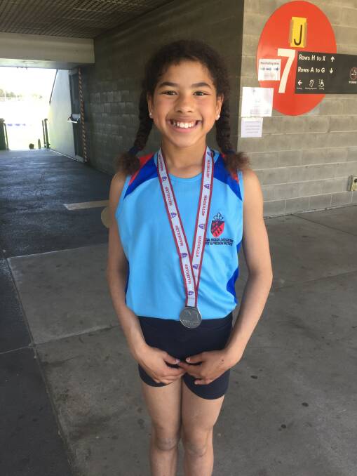 DOUBLE UP: Aleira McCowan had an excellent meet at the MacKillop athletics trials, following her result in the relay with a silver medal in the junior girls high jump.
