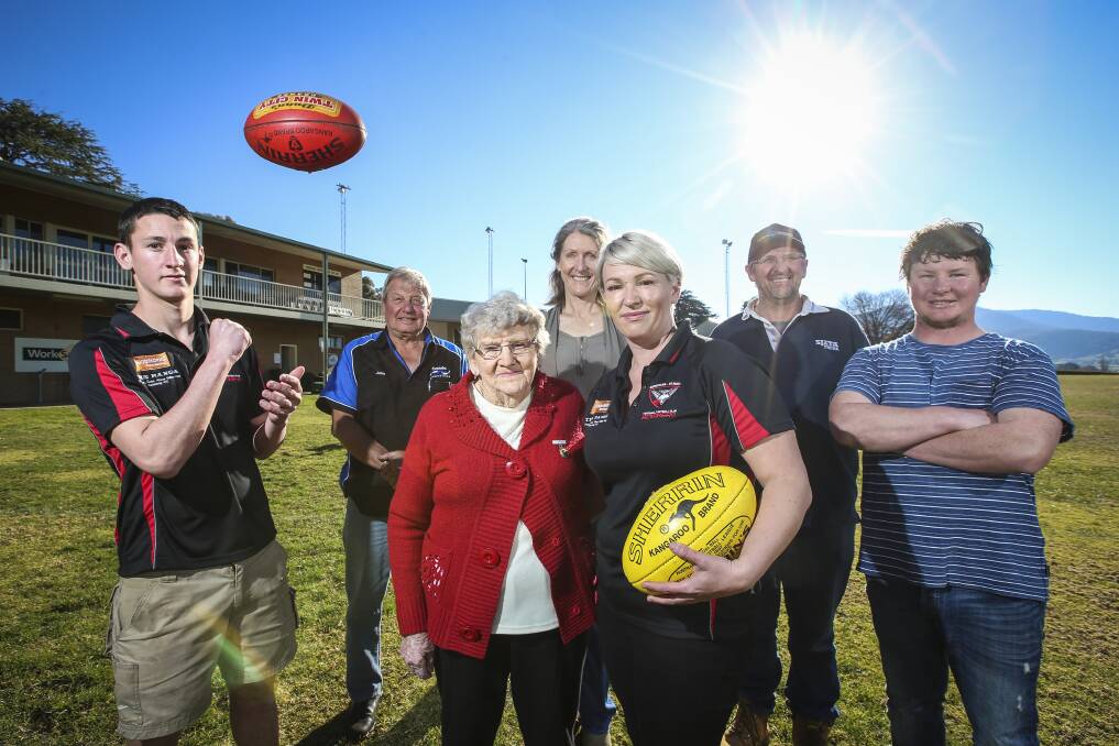 PROUD: Dederang-Mount Beauty life member Joyce Larking (middle) with president Larissa Barton, alongside Isaac Sullivan, John Ozolins, Sharon McEvoy, Rod Barton and Kyle Lochhead ahead of the club's past players day on Saturday. Picture: JAMES WILTSHIRE