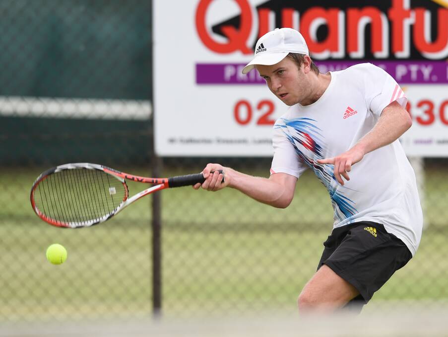 FOREHAND WINNER: Rising star Simon Thomas swings hard in his match at Albury during Sunday's Margaret Court Cup singles action.