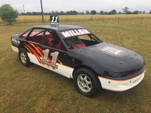 LOCAL HOPEFUL: Corowa racer Jacob Mills made history when he won his first National Production Sedans title in 2011 and will look to add another to his collection at Wahgunyah Speedway this weekend.