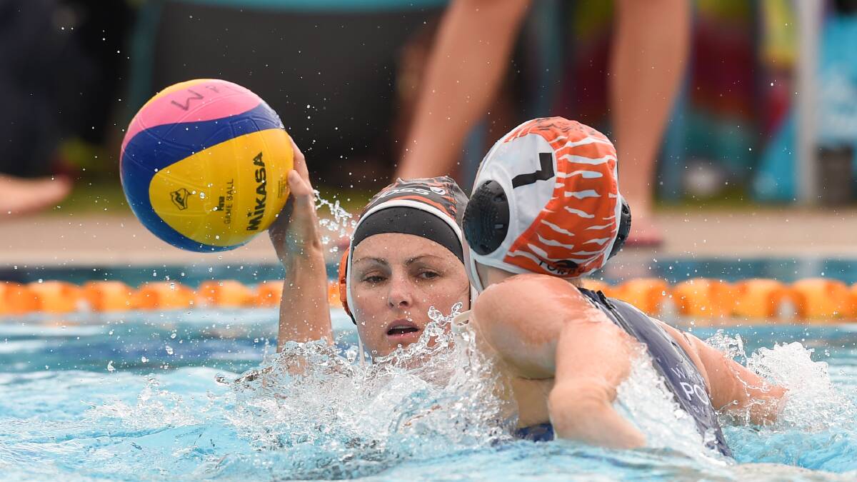 HEAD TO HEAD: Albury B's Justine Rofe is pressured by Albury A's Grace Eames during the championship's round-robin matches at Waves Wodonga.