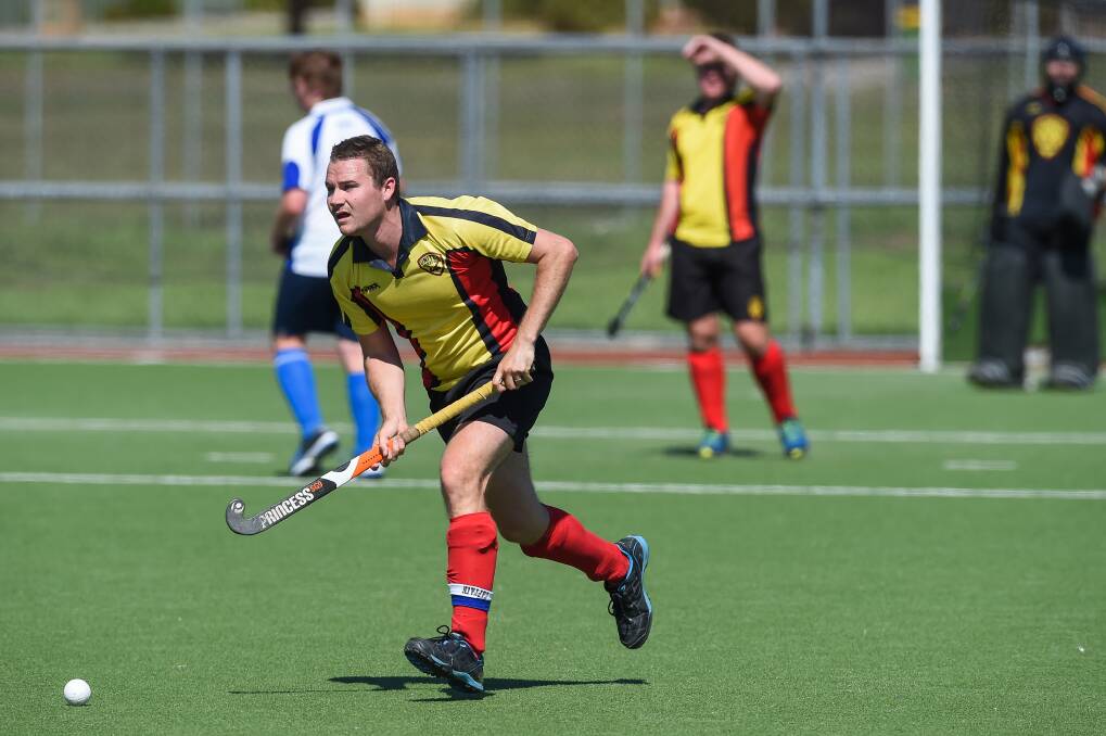 IN THE ZONE: CR United's David Foster searches for support during his side's opening round clash with Norths at Albury Hockey Centre on Sunday. Picture: MARK JESSER