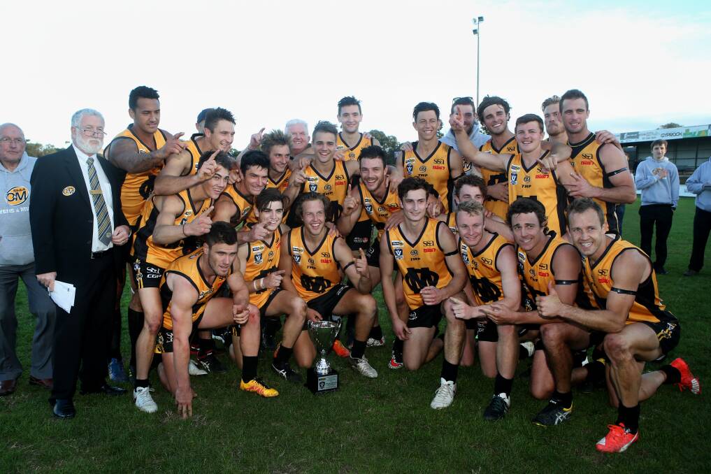 WINNERS ARE GRINNERS: Ovens and Murray celebrates after defeating Hampden Football Netball League during last year's interleague clash. 