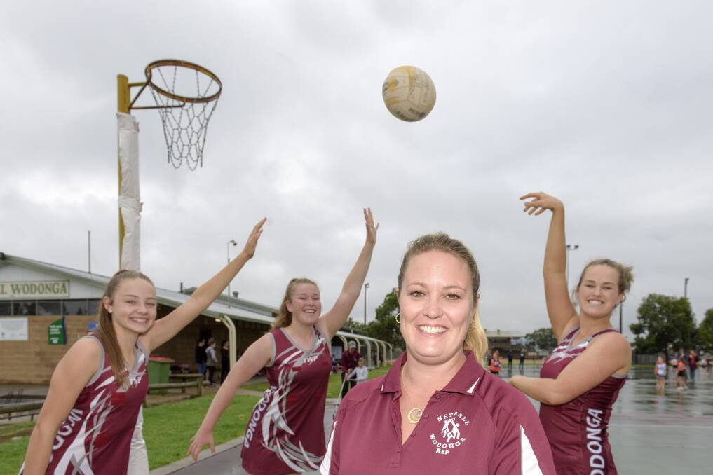 WE'RE READY: Netball Wodonga president Holly McFarlane (front) with Meg Vardy, Naidy Lee and Steph Lee ahead of the representative tournament. Picture: SIMON BAYLISS
