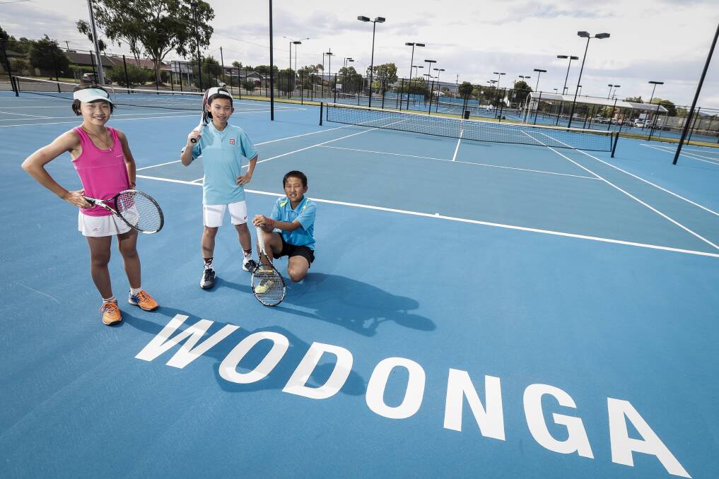 MEMORABLE: Tennis students Cici Li, 11, Richie Jing, 13, and William Li, 11, have returned to China after a month-long stay. Picture: JAMES WILTSHIRE