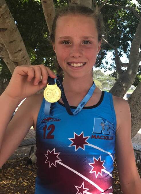 WHAT A LEAP: Holbrook's Scarlet Galvin set a new personal best on her way to winning the NSW Primary School Sports Association state high jump championship in Sydney.