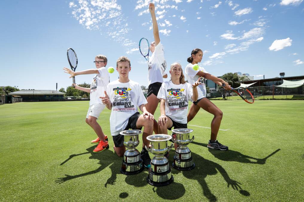 READY TO FIRE: Harry Grigg, 11, Tom Grigg, 15, Clare D'Alessandro, 15, Chelsea McGrath, 13, and Cameron Goss ,14, show off the silverware ahead of this year's Margaret Court Cup. Picture: JAMES WITLSHIRE