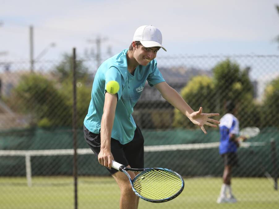 NICE SLICE: Albury's Tom Gardiner in action on day one of the 2017 Margaret Court Cup during the team's event at the Albury grass courts.