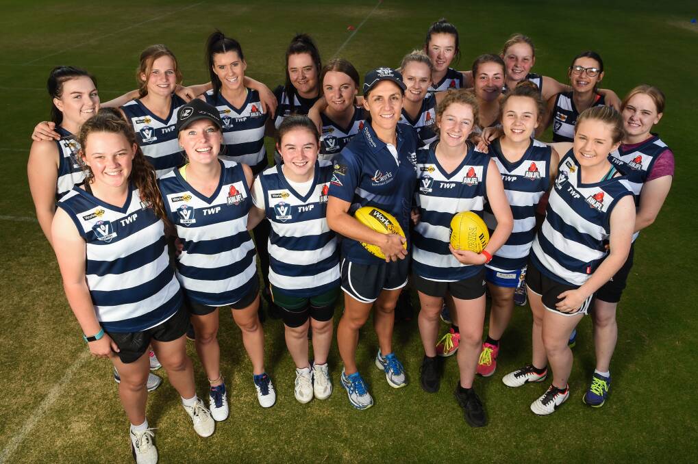 WE'RE READY: Yarrawonga Youth Girls coach Briana Cossar with her team ahead of the Pigeons inaugural season in the AFL NEB competition. Picture: MARK JESSER