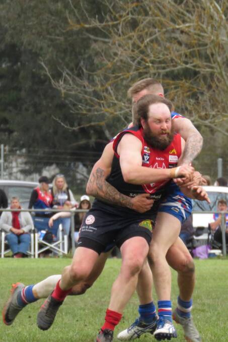 NEVER GIVE UP: Corryong coach Evan Nicholas said winning the premiership meant to world to him and his team. Picture: WENDY LAVIS