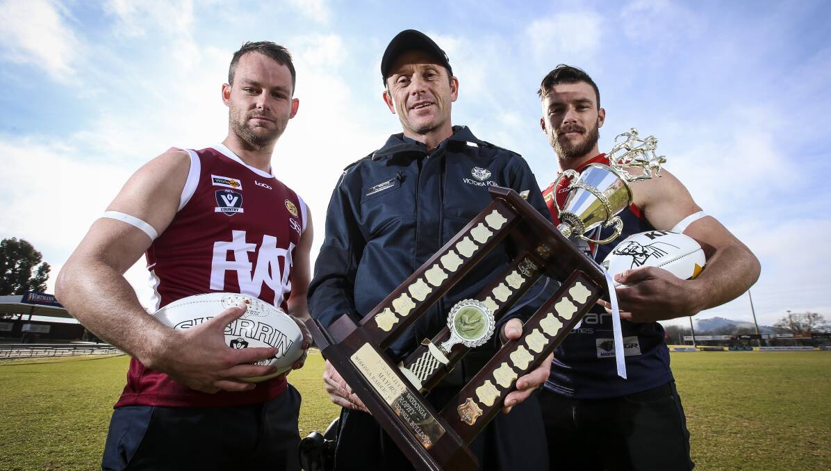 STANDING TALL: Wodonga's Jarrod Hodgkin, Sergeant Shane Martin and Wodonga Raiders' Jack Di Mizio ahead of the Ovens and Murray's fourth White Ribbon round this weekend. Picture: JAMES WILTSHIRE