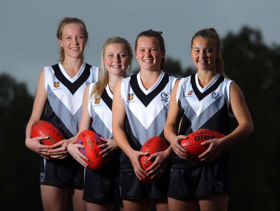 TALENTED: Alyce Parker (third from left) and Billabong High School teammates Nakita Singe, April Lieschke and Olivia Hall have all made representative AFL teams.