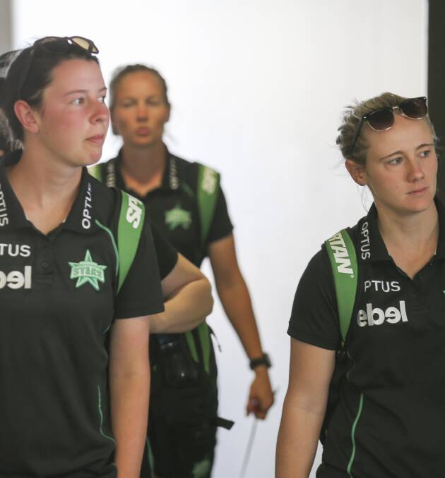 BIG ARRIVALS: Melbourne Stars WBBL players Hayleigh Brennan, Anna Lanning and Meg Lanning (behind), enter Albury Airport on Sunday. Picture: JAMES WILTSHIRE