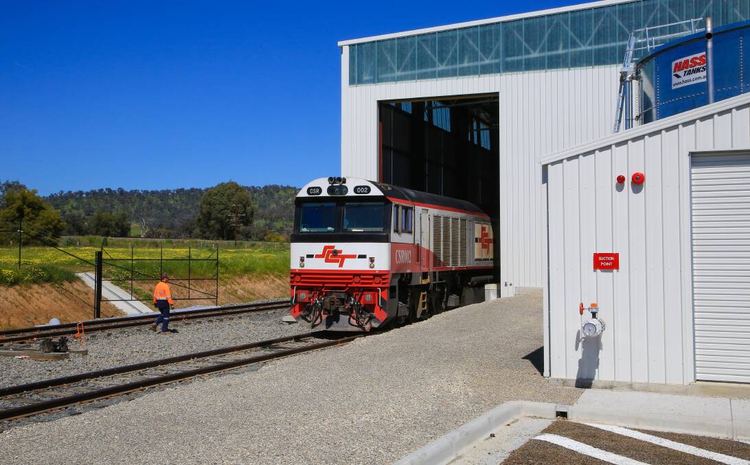ROLLING OUT: Weekly goods train services are now running from Wodonga to Melbourne, Adelaide and Perth. From January, 2017, trains will also run to Brisbane. Pictured is the first train to leave SCT's new Wodonga terminal. 