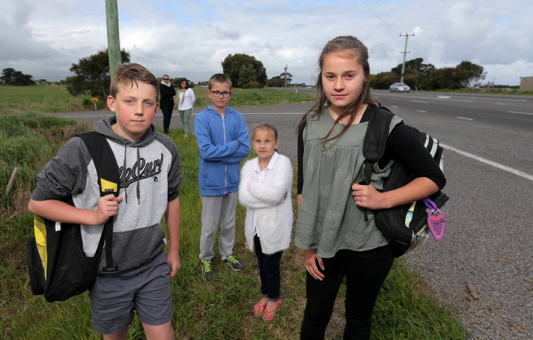 No free ride: Port Fairy's Mitchell Sholl, 12, and Campbell Sholl, 11, Laura, 9, and Audrey Gibson, 12, with parents Rachel Sholl and Jill Gibson (back). Picture: Rob Gunstone