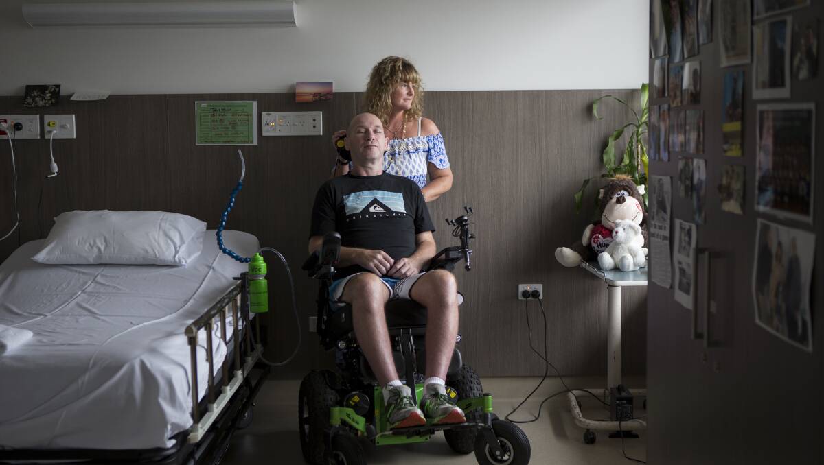 Troy Miles with wife Nicole in his room at Royal Rehab. Picture: Katherine Griffiths