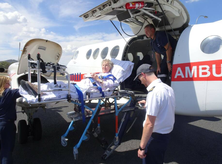 SAFE TRAVELS:  Eleonore Klein being prepared for her Air Ambulance flight home by the Mercy nursing staff.