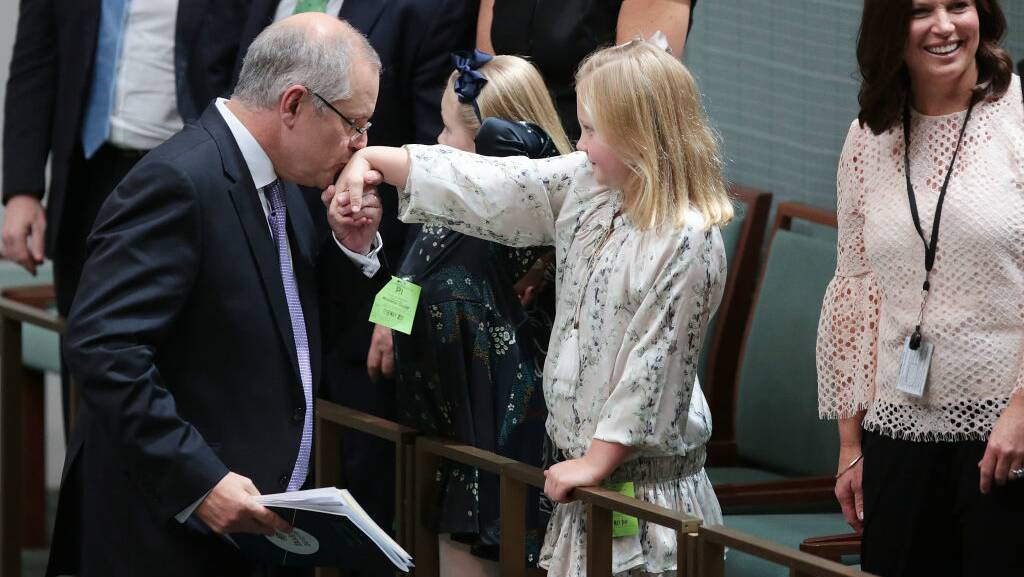 HE'S HAPPY: Treasurer Scott Morrison kisses his daughter's hand after delivering the budget. Cathy McGowan wants Indi constituents to let her know their thoughts. 