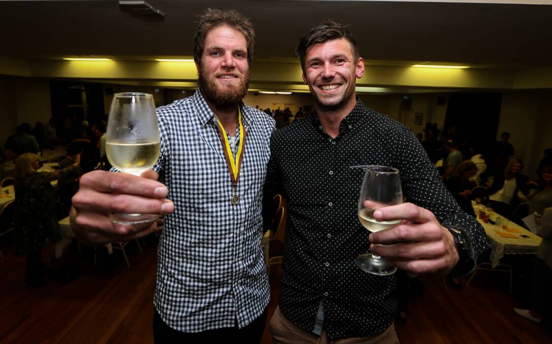 CHEERS: Peter Hancock with Jesse Johnston, who he edged out by two votes to win the Azzi medal for the second time. Picture: JAMES WILTSHIRE