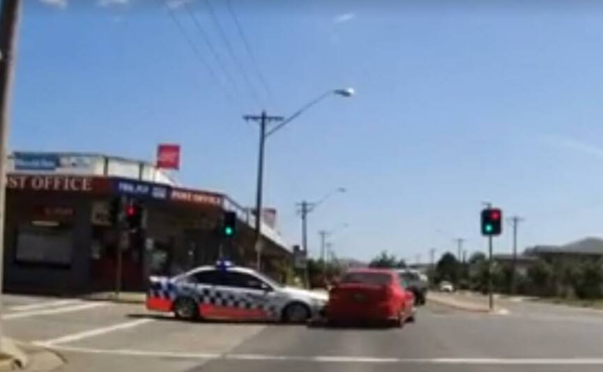 DRIVER ERROR: A still from the dash-cam footage of an incident in North Albury where a member of the public failed to give way to a police car. 