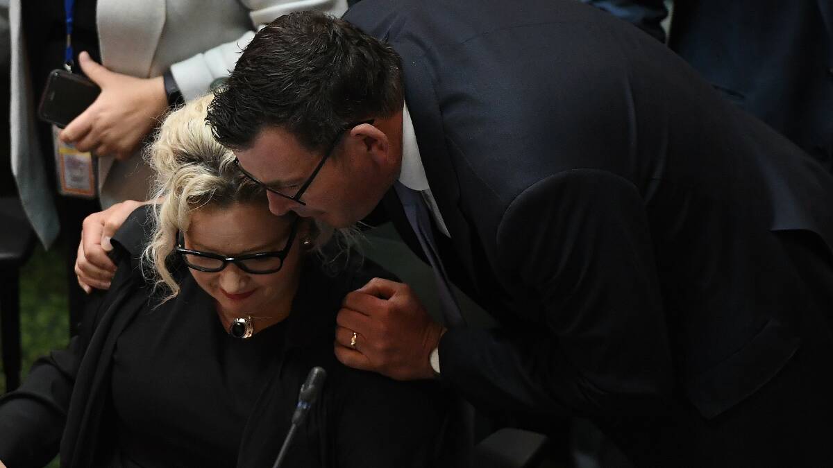 FIRST STEP: Premier Daniel Andrews embraces health minister Jill Hennessy after Victoria's assisted dying bill passed in the Legislative Council on Friday, 47-37. 
