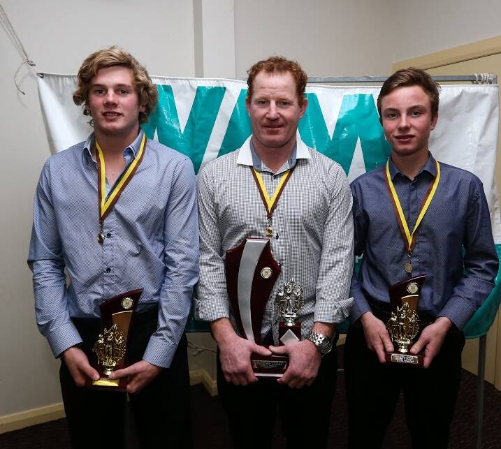 WINNERS: Jacob Chant, Josh Firman and George Sandral with their trophies for winning third, reserve and fourth grade best and fairests. Picture: JAMES WILTSHIRE