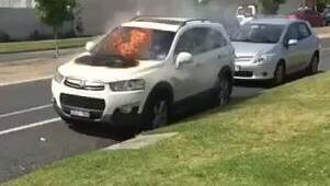 Car catches fire on school pick-up