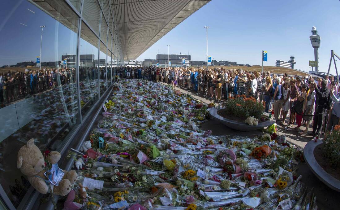 A sea of floral tributes at Schiphol Airport in the Netherlands honoured the victims of Malaysia Airlines flight MH17, shot down over the Ukraine last year.