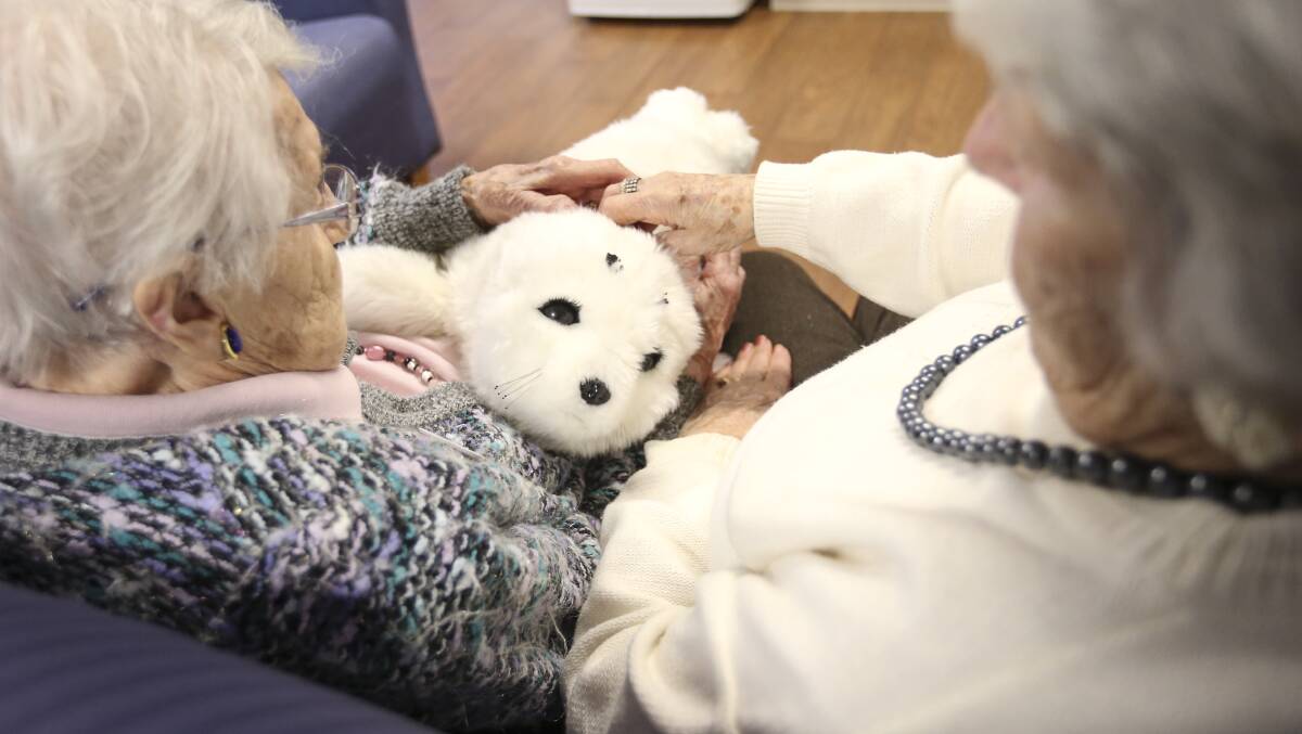 THERAPY: A reader is impressed by the robotic pet therapy being offered by Paro - the robot seal pup - at Murray Vale Shalem hostel after a report in Friday's Border Mail. 