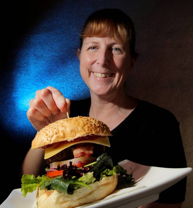 GOOD TASTE: The Burger Bar owner Nicole Cornell says Australian burgers measure up. The Albury eatery uses flavoursome, locally-produced Wagyu beef to form its 150-gram patties. Picture: DAVID THORPE