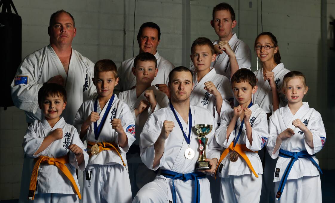 WINNING TEAM: Two students from the Riverina Martial Arts school have won national titles. Picture: MARK JESSER