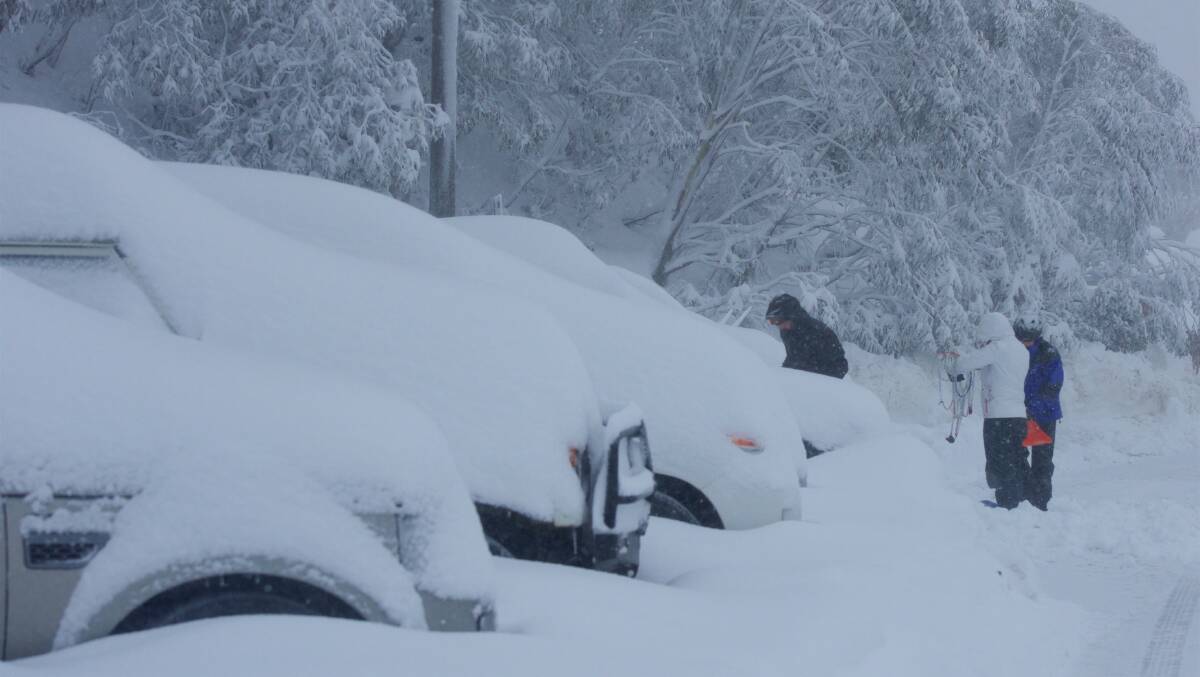 Falls Creek car park after a blizzard on Sunday. Photo: Chris Hocking