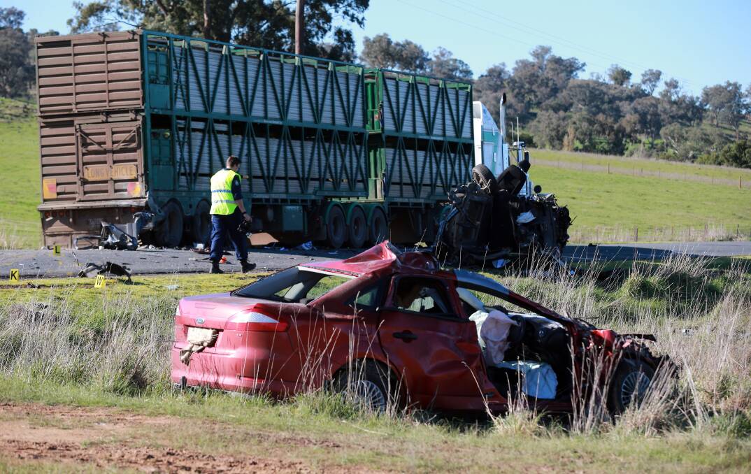 The man’s red Ford Mondeo was hit by a Ford Territory that moments earlier had been involved in a crash with a livestock truck.