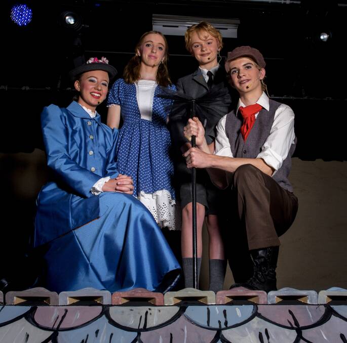 MAGICAL MOMENT: The Scots School's Mary Poppins leading cast members Imogen Hanlon, 15, Meg Paterson, 15, Archie Myers, 7, and Caleb Murray, 17, before their matinee performance and shows. Picture: SIMON BAYLISS