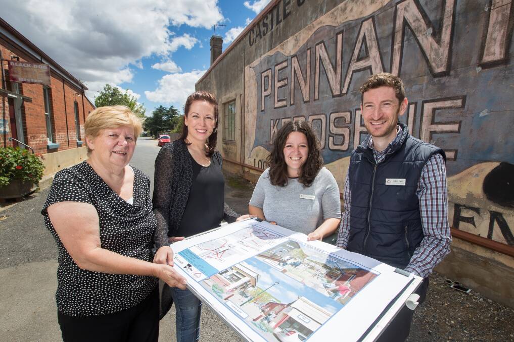 READY: Indigo councillor Barb Murdoch, Jaclyn Symes, Indigo deputy mayor Sophie Price and project delivery officer Adam Flynn look at the plans for Martins Lane in Chiltern - works will be finished by November. Picture: MARK JESSER