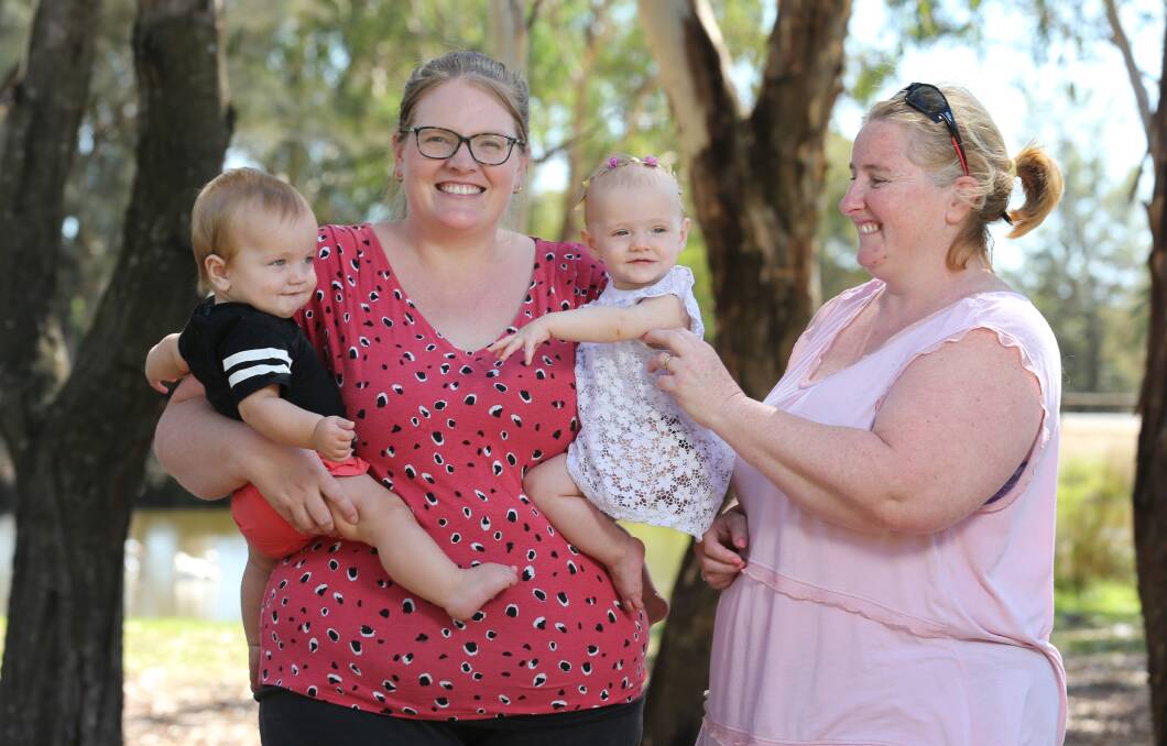 NETWORK OF SUPPORT: Samantha Young, with 18-month-old twins Cameron and Emma, and Abby Cooper. Picture: KYLIE ESLER