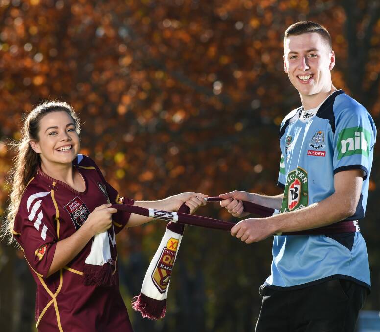 HEAD TO HEAD: Queensland supporter Charlee Webb will face off with her boyfriend Aidan Young, a Blues man, when they watch the State of Origin opener. She's picking a four-point win for the Maroons. Picture: MARK JESSER