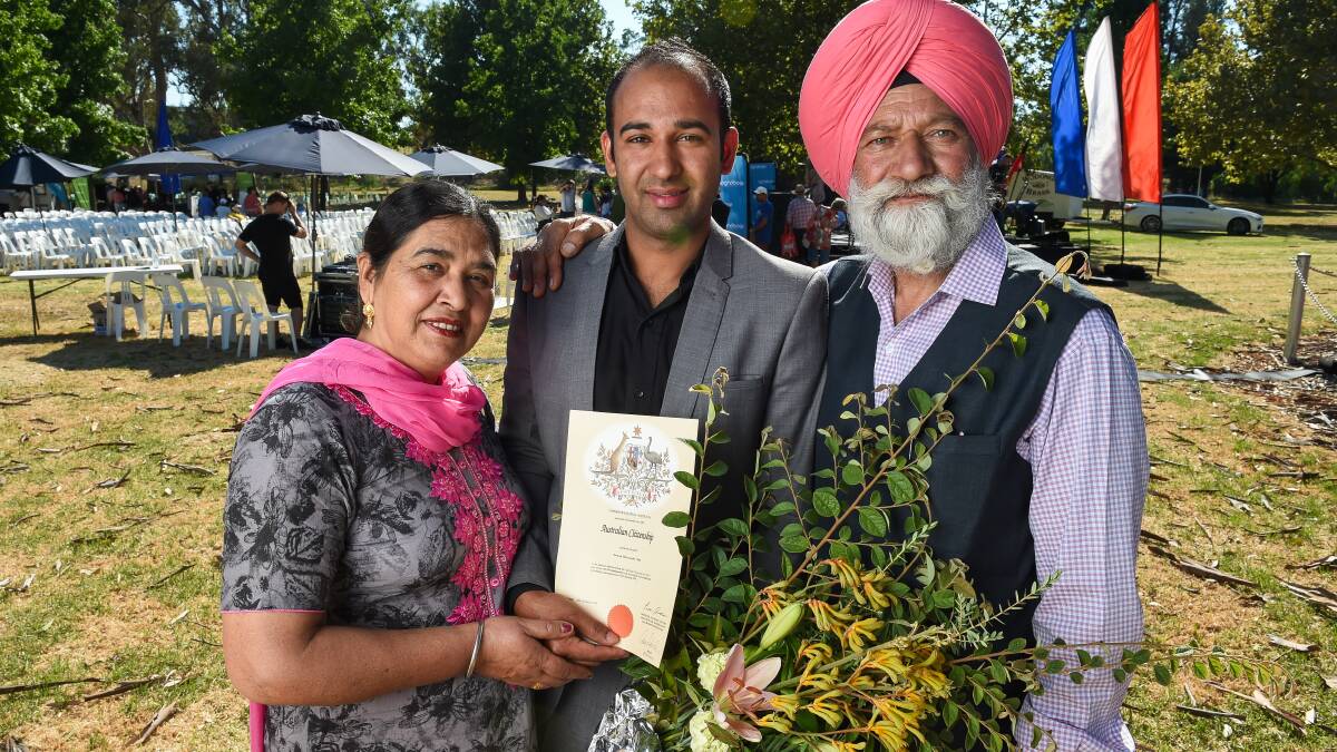 PROUD: New Wodonga citizen Dilbag Singh, a mechanic for Holden, is congratulated by his parents Sugit Kaur and Sukhdev Singh, who travelled from India to attend the ceremony. Picture: MARK JESSER