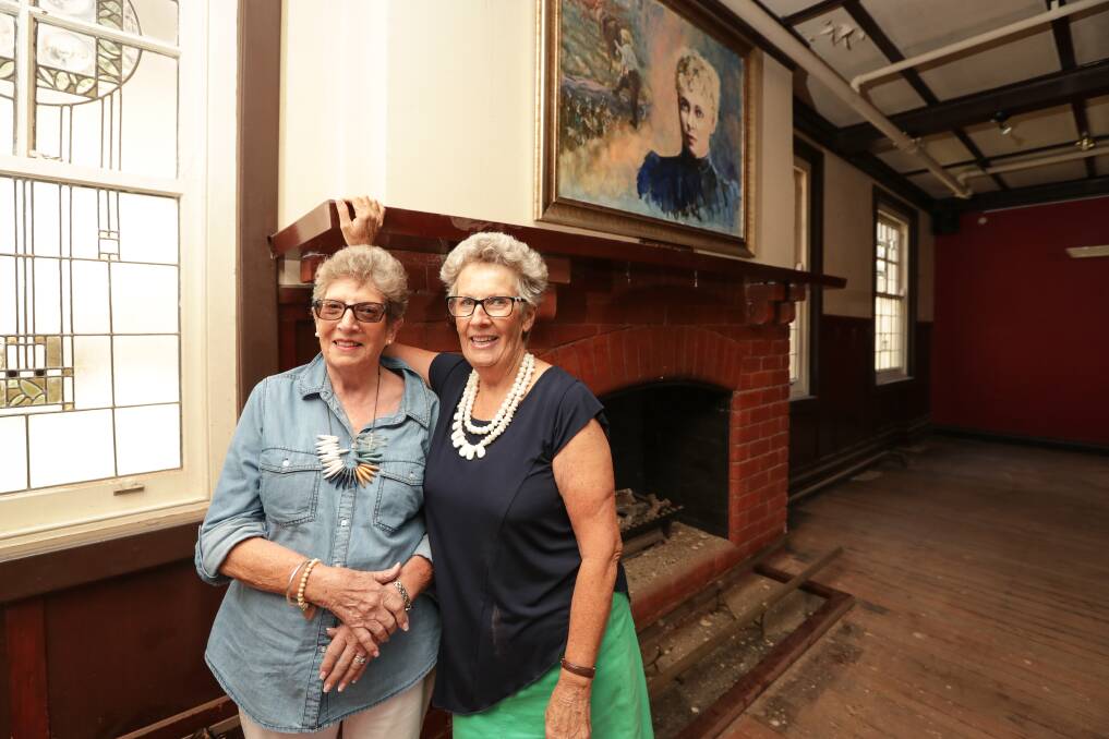 FLASHBACK: Paula McEachern and sister Colleen Howard stand in Manfield's cafe, remembering their time spent there in the 1980s. Picture: JAMES WILTSHIRE