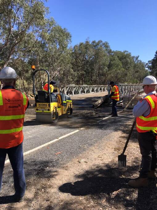ONGOING: VicRoads staff were on site working on the temporary bridge over Hodgson Creek on January 2, but it was still closed yesterday to the frustration of surrounding businesses and residents. Picture: INDIGO VINEYARD/FACEBOOK